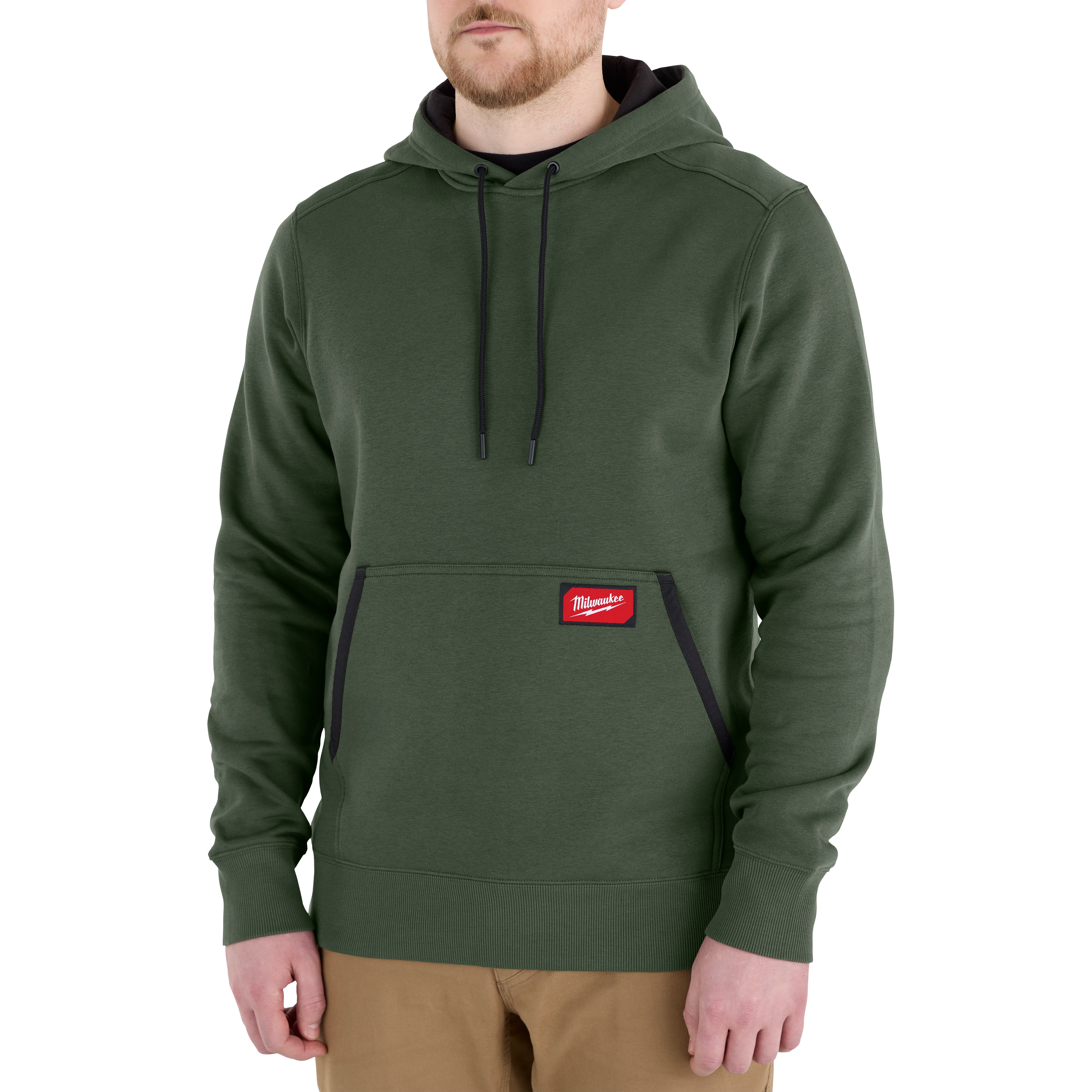 Man wearing a green FREEFLEX Pullover Hoodie with a front pocket and black drawstrings.