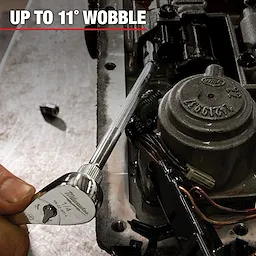 A close-up of a hand using a Milwaukee wrench, part of Mechanic Hand Tools, to tighten a bolt on machinery. The image caption reads "UP TO 11° WOBBLE," indicating the wrench’s flexibility for tight spaces.